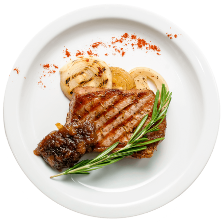 Стейк зі свинини під соусом агродольче і цибулею гриль